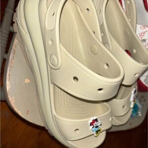CROCS woman’s Sz 10    Stomp.  Cream Sandals with Disney Charm